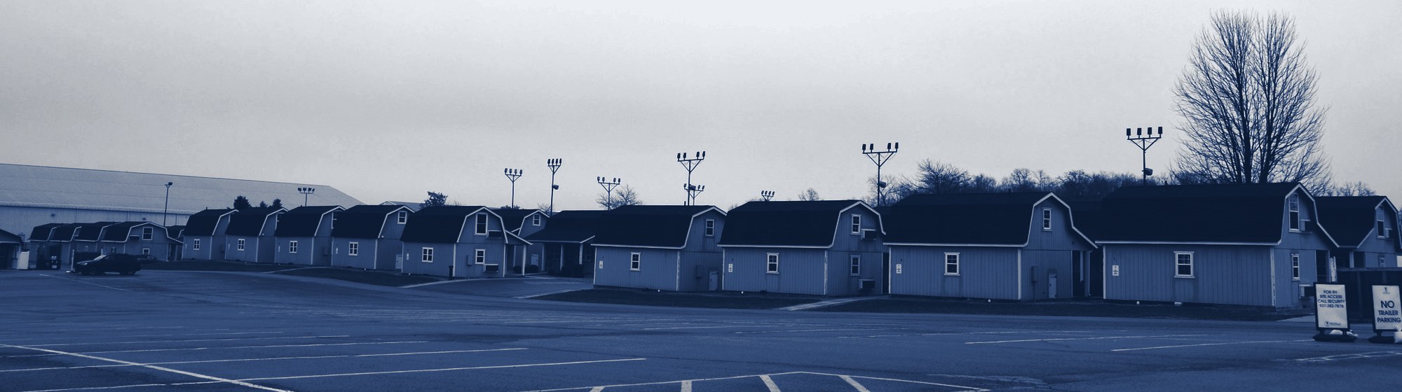 Rows of self-storage units, tinted navy